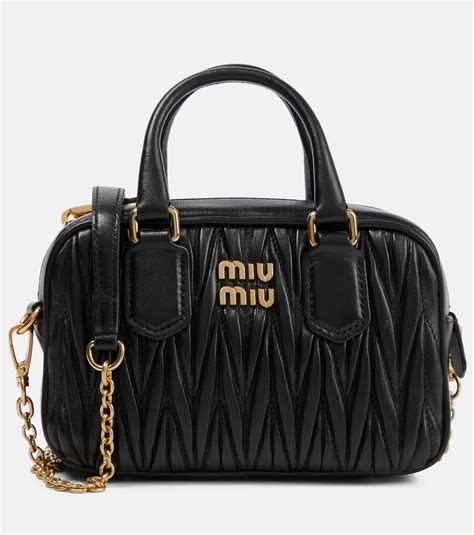 miu miu crossbody handbag in black|farfetch miumiou bags.